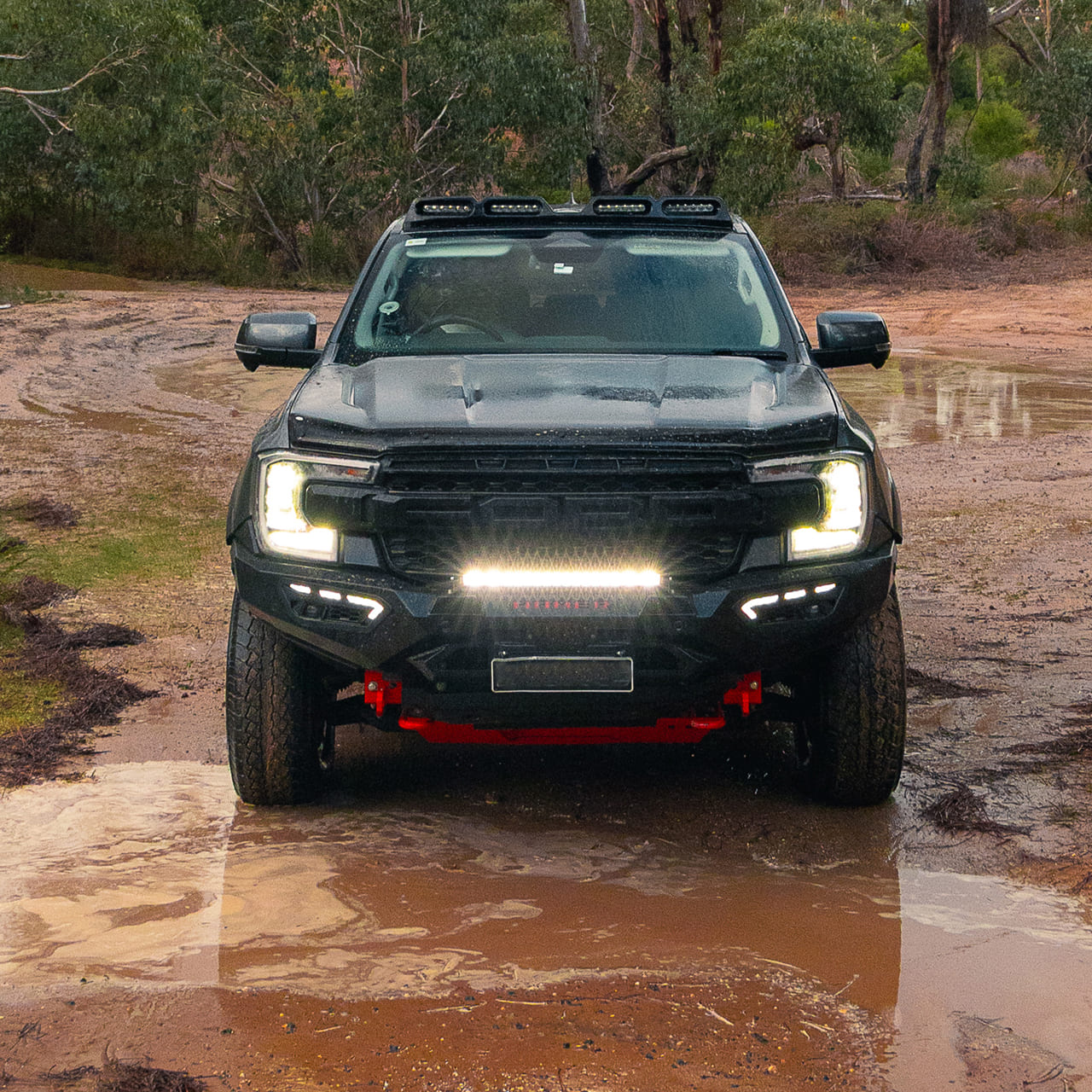NightVision 21.5-inch LED light bar fitted to a 4x4 on a muddy off-road track