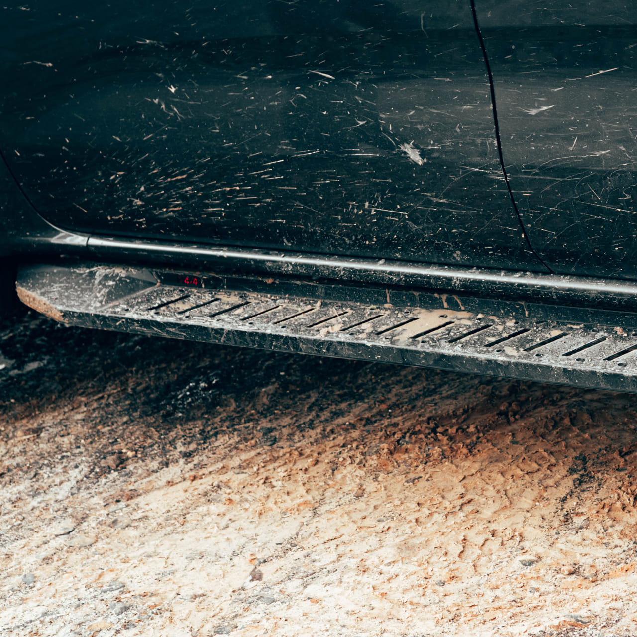 ANTZ off-road running board fitted to a muddy Next Gen Ford Ranger after off-road use