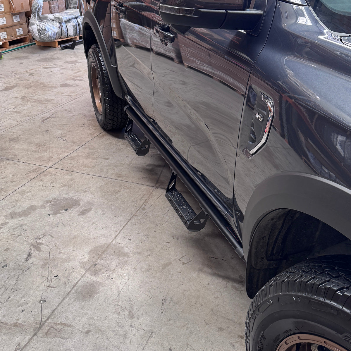 Black ANTZ Street Steps fitted along the side of a Next Gen Ford Ranger