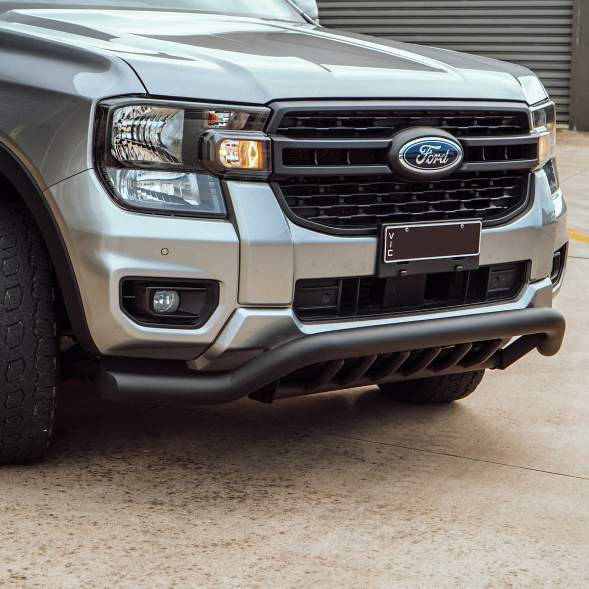 Black 70mm steel front nudge bar installed on a Next Gen Ford Ranger